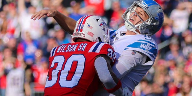 New England Patriots OLB Mack Wilson Sr. is called for roughing the passer as he hits Detroit Lions QB Jared Goff. The Patriots beat the Lions 29-0.
