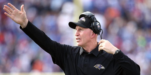 Baltimore Ravens assistant head coach Jerry Rosburg points to the sideline during the NFL game against the Buffalo Bills at Ralph Wilson Stadium on September 29, 2013 in Orchard Park, New York.