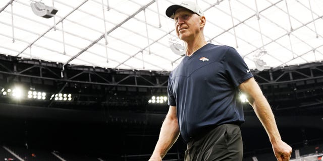 Denver Broncos Assistant coach Jerry Rosburg walks around Allegiant Stadium during warm-ups before the game on October 2, 2022 in Las Vegas, Nevada. Las Vegas Raiders will take on the Denver Broncos during week four of the NFL season.