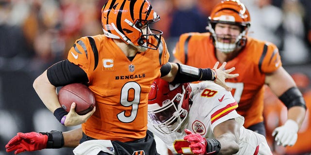 Joe Burrow of the Cincinnati Bengals carries the ball against the Kansas City Chiefs during the second half at Paycor Stadium on Dec. 4, 2022, in Cincinnati.