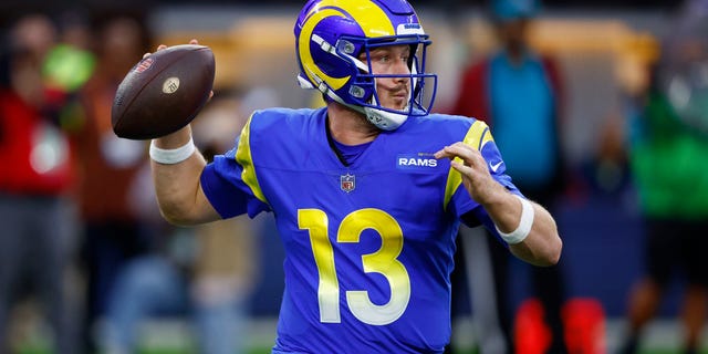 John Wolford of the Los Angeles Rams throws the ball during the first quarter against the Seattle Seahawks at SoFi Stadium on Dec. 4, 2022, in Inglewood, California.