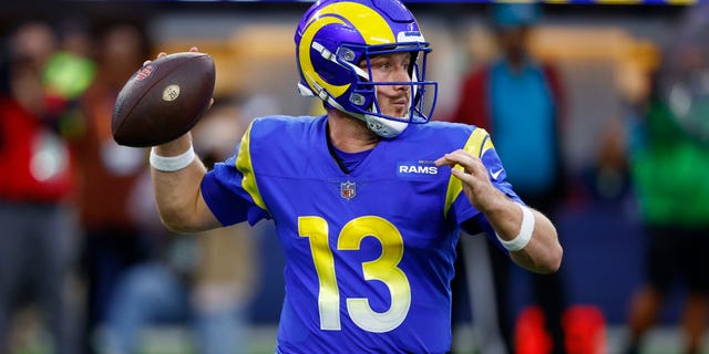 John Wolford of the Los Angeles Rams throws the ball during the first quarter against the Seattle Seahawks at SoFi Stadium on Dec. 4, 2022, in Inglewood, California.