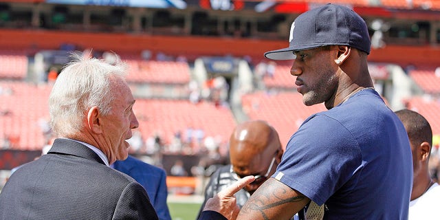 Jerry Jones of the Dallas Cowboys talks with LeBron James of the Cleveland Cavs during the Cowboys 28-10 win over the Cleveland Browns at Cleveland Browns Stadium in Cleveland, Ohio.
