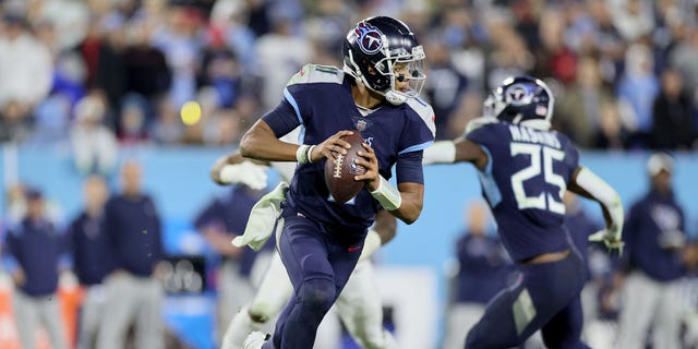 Joshua Dobbs #11 of the Tennessee Titans scrambles against the Dallas Cowboys during the third quarter of the game at Nissan Stadium on December 29, 2022 in Nashville, Tennessee.