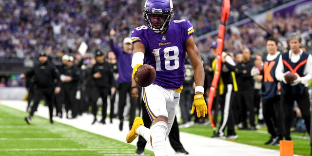 Justin Jefferson of the Minnesota Vikings scores a touchdown against the Indianapolis Colts during the fourth quarter of a game at U.S. Bank Stadium Dec. 17, 2022, in Minneapolis.