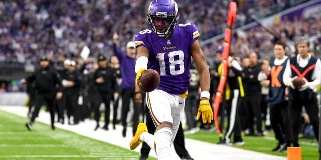 Justin Jefferson of the Minnesota Vikings scores a touchdown against the Indianapolis Colts during the fourth quarter of a game at U.S. Bank Stadium Dec. 17, 2022, in Minneapolis.