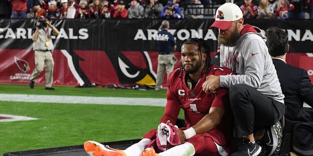 Arizona Cardinals' Kyler Murray #1 is carted off the field after being injured against the New England Patriots during the first quarter of play at State Farm Stadium December 12, 2022 in Glendale, Arizona.
