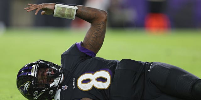 Baltimore Ravens quarterback Lamar Jackson reacts to a roughing the passer call against the Cleveland Browns on Nov. 28, 2021.