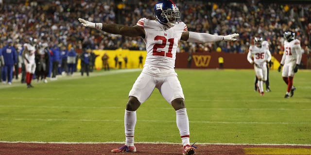 Landon Collins #21 of the New York Giants celebrates stopping the Washington Commanders on third down during the fourth quarter at FedExField on December 18, 2022 in Landover, Maryland.