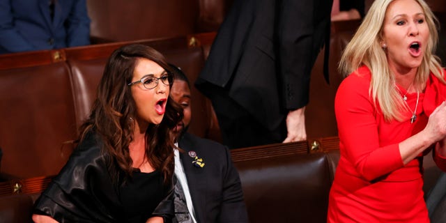 Rep. Lauren Boebert, R-Colo., and Rep. Marjorie Taylor Greene, R-Ga., scream "Build the Wall" as President Biden delivers the State of the Union address during a joint session of Congress in the U.S. Capitol’s House Chamber March 1, 2022, in Washington, D.C.
