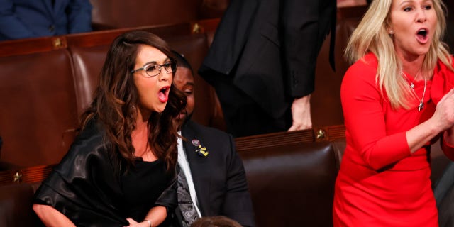 Rep. Lauren Boebert, R-Colo., and Rep. Marjorie Taylor Greene, R-Ga., scream "Build the Wall" as President Biden delivers the State of the Union address during a joint session of Congress in the U.S. Capitol’s House Chamber March 1, 2022, in Washington, D.C.