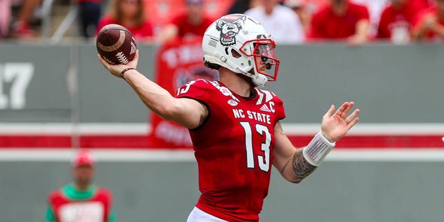 Devin Leary of the North Carolina State Wolfpack attempts to pass the ball during a game against the Charleston Southern Buccaneers Sept. 10, 2022, at Carter-Finley Stadium in Raleigh, N.C.