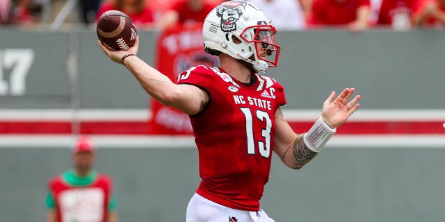 Devin Leary of the North Carolina State Wolfpack attempts to pass the ball during a game against the Charleston Southern Buccaneers Sept. 10, 2022, at Carter-Finley Stadium in Raleigh, N.C.