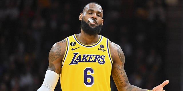 LeBron James of the Los Angeles Lakers shrugs during the third quarter against the Cleveland Cavaliers at Rocket Mortgage Fieldhouse Dec. 6, 2022, in Cleveland.