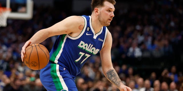 Luka Doncic of the Dallas Mavericks dribbles the ball against the New York Knicks in the second half at American Airlines Center on December 27, 2022 in Dallas, Texas.
