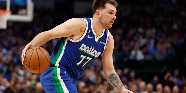 Luka Doncic of the Dallas Mavericks dribbles the ball against the New York Knicks in the second half at the American Airlines Center on December 27, 2022 in Dallas, Texas.