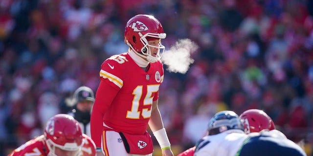 Patrick Mahomes #15 of the Kansas City Chiefs calls a play during the first quarter against the Seattle Seahawks at Arrowhead Stadium on December 24, 2022, in Kansas City, Missouri. 