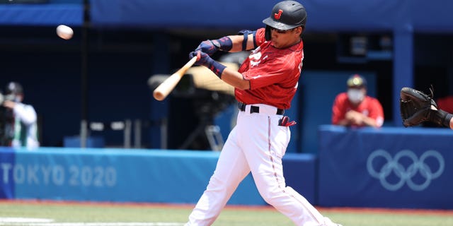 Masataka Yoshida #34 of Team Japan flies out to left field in the first inning against Team Mexico during the baseball opening round Group A game on day eight of the Tokyo 2020 Olympic Games at Yokohama Baseball Stadium on July 31, 2021 in Yokohama, Kanagawa, Japan.