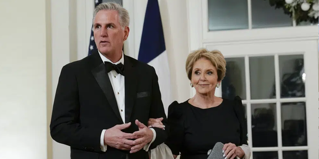 House Minority Leader Kevin McCarthy of Calif., and his mother Roberta McCarthy arrive for the State Dinner with President Joe Biden and French President Emmanuel Macron at the White House in Washington, Thursday, Dec. 1, 2022