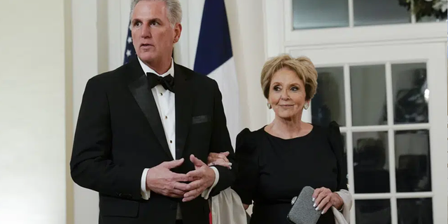 House Minority Leader Kevin McCarthy of California and his mother Roberta McCarthy arrive for the State Dinner with President Joe Biden and French President Emmanuel Macron at the White House in Washington, Thursday, Dec. 1, 2022.