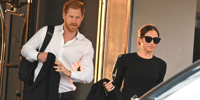 Prince Harry and Meghan Markle are photographed in New York City on Monday.