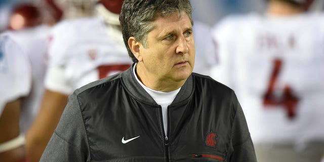 Washington State head coach Mike Leach walks off the field at the end of warmups prior to the Holiday Bowl game between the Washington State Cougars and the Michigan State Spartans Dec. 28, 2017, at SDCCU Stadium in San Diego.