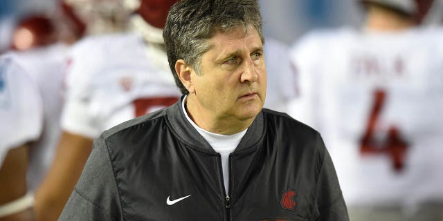 Washington State head coach Mike Leach walks off the field at the end of warmups prior to the Holiday Bowl game between the Washington State Cougars and the Michigan State Spartans Dec. 28, 2017, at SDCCU Stadium in San Diego.