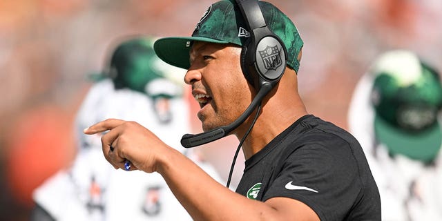 Wide receivers coach Miles Austin of the New York Jets gestures during the first half of the game against the Cleveland Browns at FirstEnergy Stadium in Cleveland on Sept. 18, 2022.