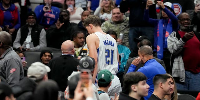 Moritz Wagner, #21 of the Orlando Magic, is knocked out of the game against the Detroit Pistons in the second quarter at Little Caesars Arena on December 28, 2022 in Detroit.