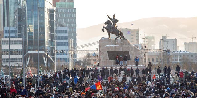 Protesters gather on Sukhbaatar Square in Ulaanbaatar in Mongolia on Monday, Dec. 5, 2022.