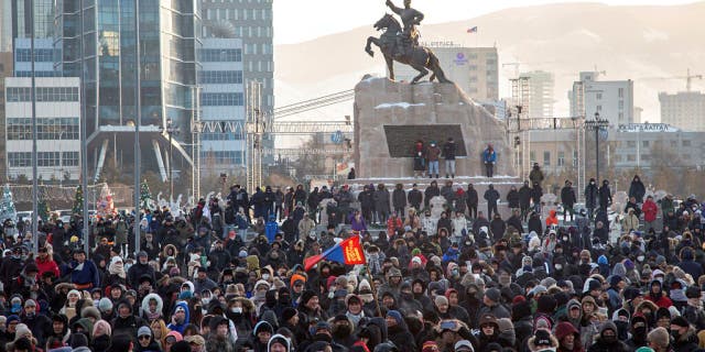 Protesters gather on Sukhbaatar Square in Ulaanbaatar in Mongolia on Monday, Dec. 5, 2022.