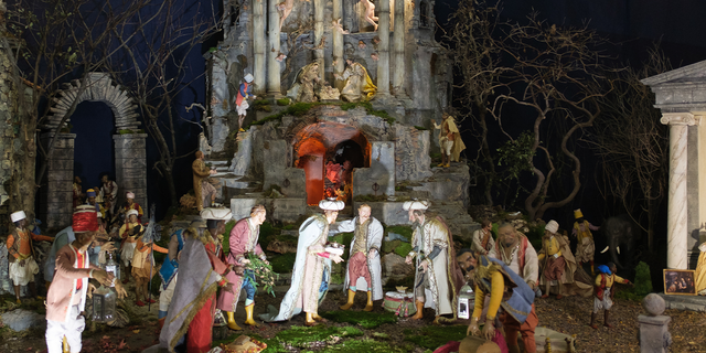 Several figures representing a scene of the birth of Christ are shown in the traditional Christmas nativity scene of Neapolitan origin from the 19th century.