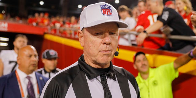 Referee Carl Cheffers returns to the field after a roughing the passer call during the game between the Kansas City Chiefs and the Las Vegas Raiders at Arrowhead Stadium in Kansas City, Missouri, on Oct. 10, 2022.