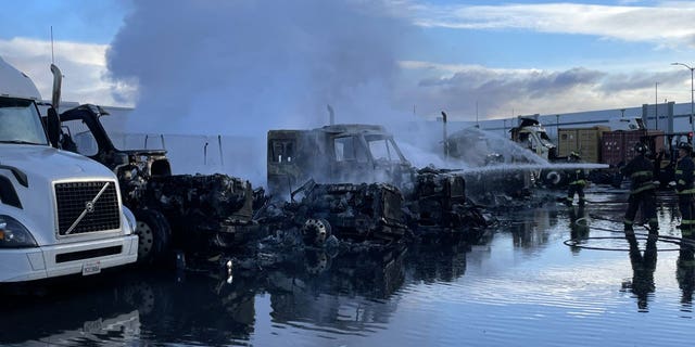 Several big rig trucks caught on fire Sunday morning in Oakland, CA, with the cause of the fire unkown. 