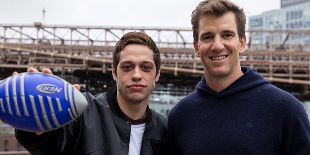 Comedian Pete Davidson, left, and New York Giants legend Eli Manning