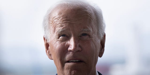 President Biden was guided offstage Monday by a young girl.