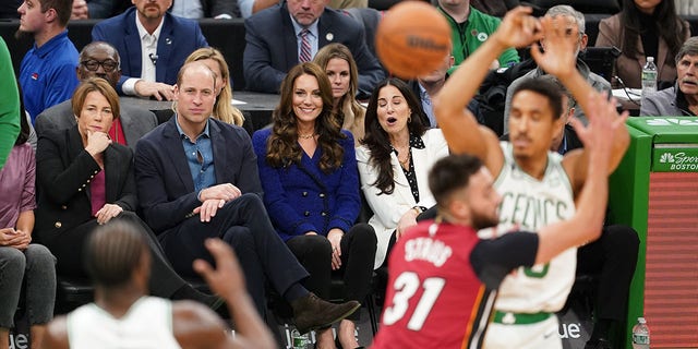 Prince William, Prince of Wales and Catherine, Princess of Wales, watch the NBA basketball game between the Boston Celtics and the Miami Heat at TD Garden on Nov. 30, 2022 in Boston, Mass.
