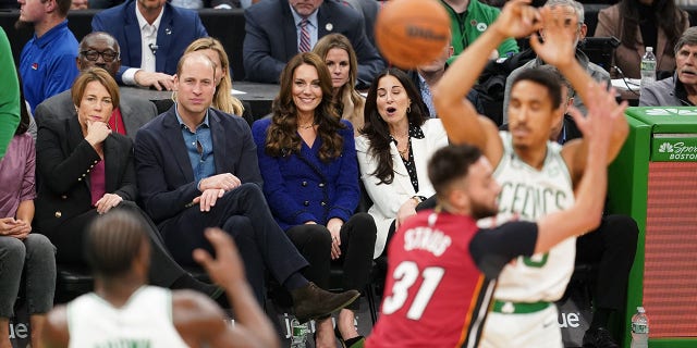 Prince William, Prince of Wales and Catherine, Princess of Wales, watch the NBA basketball game between the Boston Celtics and the Miami Heat at TD Garden on Nov. 30, 2022 in Boston, Mass.