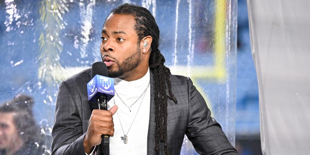 Richard Sherman talks on Thursday Night Football Kickoff before the Atlanta Falcons-Carolina Panthers game at Bank of America Stadium Nov. 10, 2022, in Charlotte, N.C.