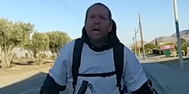 California man Kenneth Scott Wallis seen in body camera footage after sheriff's deputy stopped him while he was riding a bike. 