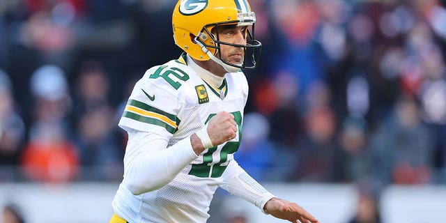 Aaron Rodgers of the Green Bay Packers celebrates after a successful two-point conversion against the Chicago Bears during the fourth quarter of a game at Soldier Field Dec. 4, 2022, in Chicago.