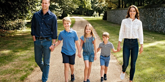 Prince William and Kate Middleton shared two new photos taken by the family's trusted photographer, Matt Porteus, taken on the same day as their family Christmas card photo. 