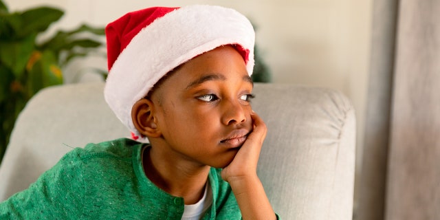 A young boy as described in a Reddit post (not pictured) was reportedly left out of a family holiday tradition for Christmas. "Apologize to your stepson for thinking that a nine-year-old feeling 'less than' is A-OK," said one commenter on Reddit about the controversy.