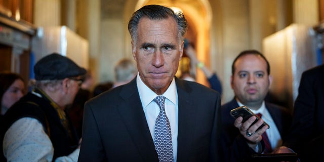Senator Mitt Romney Leaves Senate Floor After Same-Sex Marriage Vote