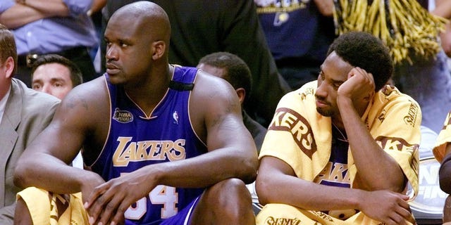 Shaquille O'Neal, left, and Kobe Bryant, right, of the Los Angeles Lakers sit on the bench June 16, 2000, during the second half of game five of the NBA Finals against the Indiana Pacers at Conseco Fieldhouse in Indianapolis. The Pacers won the game 120-87, but still trailed the Lakers 3-2 in the best-of-seven series.