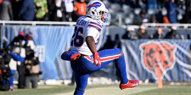 Devin Singletary #26 of the Buffalo Bills celebrates after a touchdown during the third quarter in the game against the Chicago Bears at Soldier Field on Dec. 24, 2022 in Chicago, Ill.