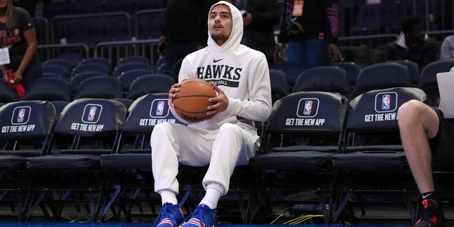 Trae Young of the Atlanta Hawks sits on the bench before a game against the New York Knicks Dec. 7, 2022, at Madison Square Garden in New York City. 