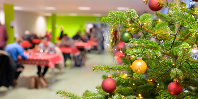 A decorated Christmas tree stands in a small room of a facility in Hamburg, Germany, Dec. 24, 2021.