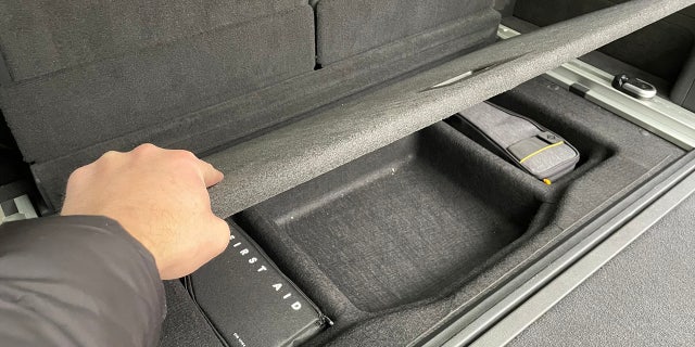 There is a small storage area beneath the cargo floor and an airless spare tire under it.