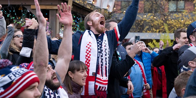 Fans celebrate at a watch party after the World Cup Group B soccer match between Iran and the United States on Tuesday, Nov. 29, 2022, in Washington. The U.S. won 1-0.